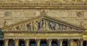 The carved stone pediment and columns of the National Archives Building