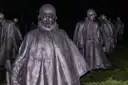 The steel soldier statues of the Korean War Veterans Memorial at night