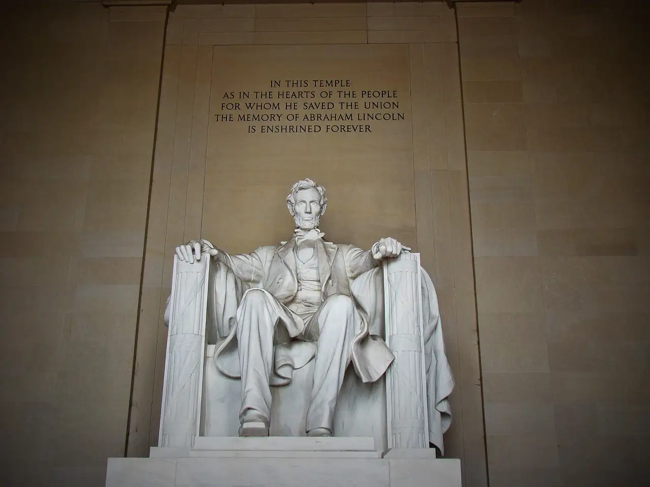 The seated statue of Abraham Lincoln inside the Lincoln Memorial