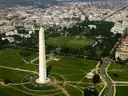 The Washington Monument and the green lawns of the National Mall, seen from above